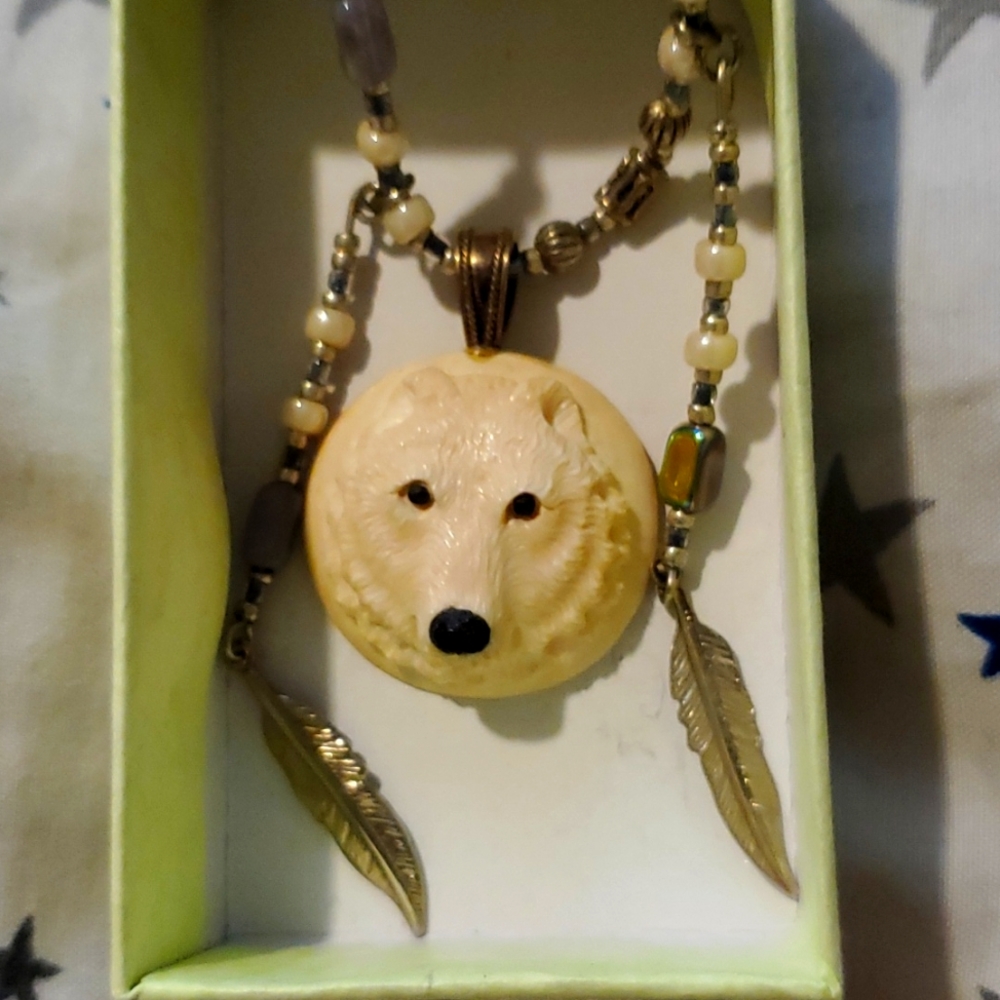 Wolf and feather necklace